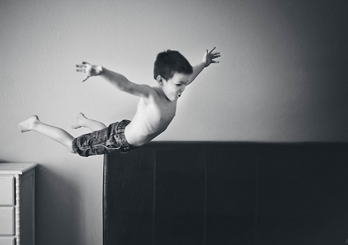 Boy diving in the air