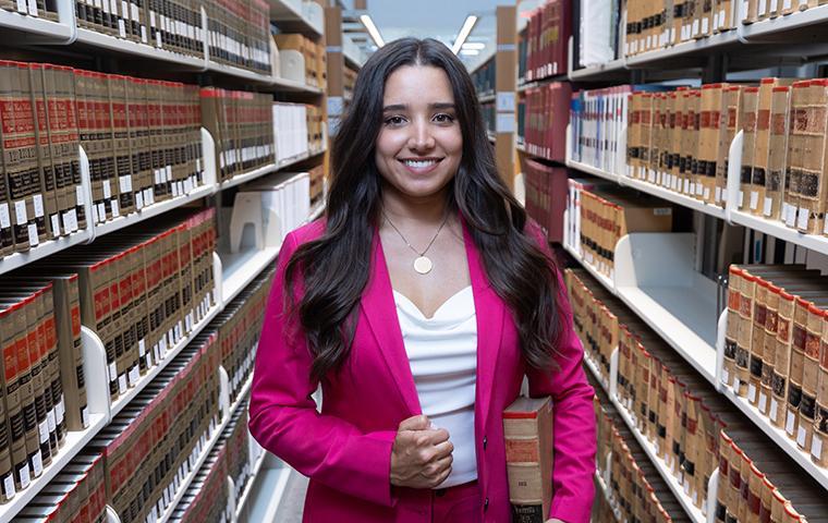 Mirelle Raza '15, pictured in the SCU School of Law's library.