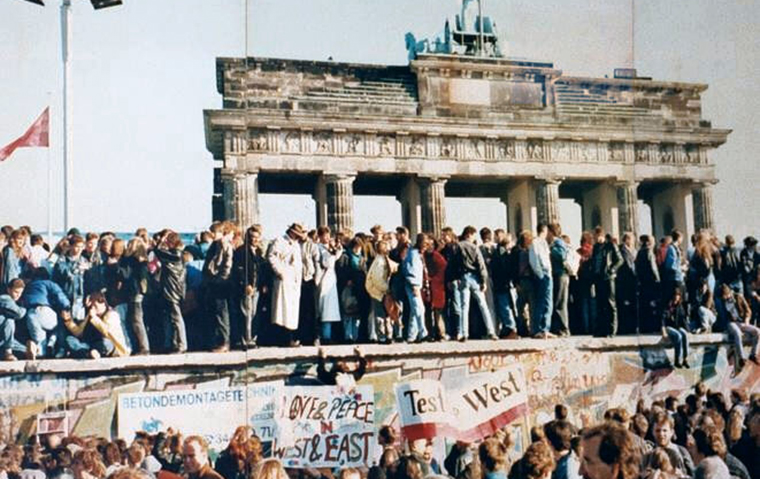 The Fall of the Berlin Wall, 1989. The photo shows a part of a public photo documentation wall at the Brandenburg Gate, Berlin. 