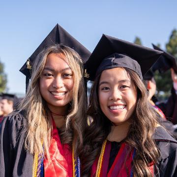 Leavey School of Business students in their commencement attire