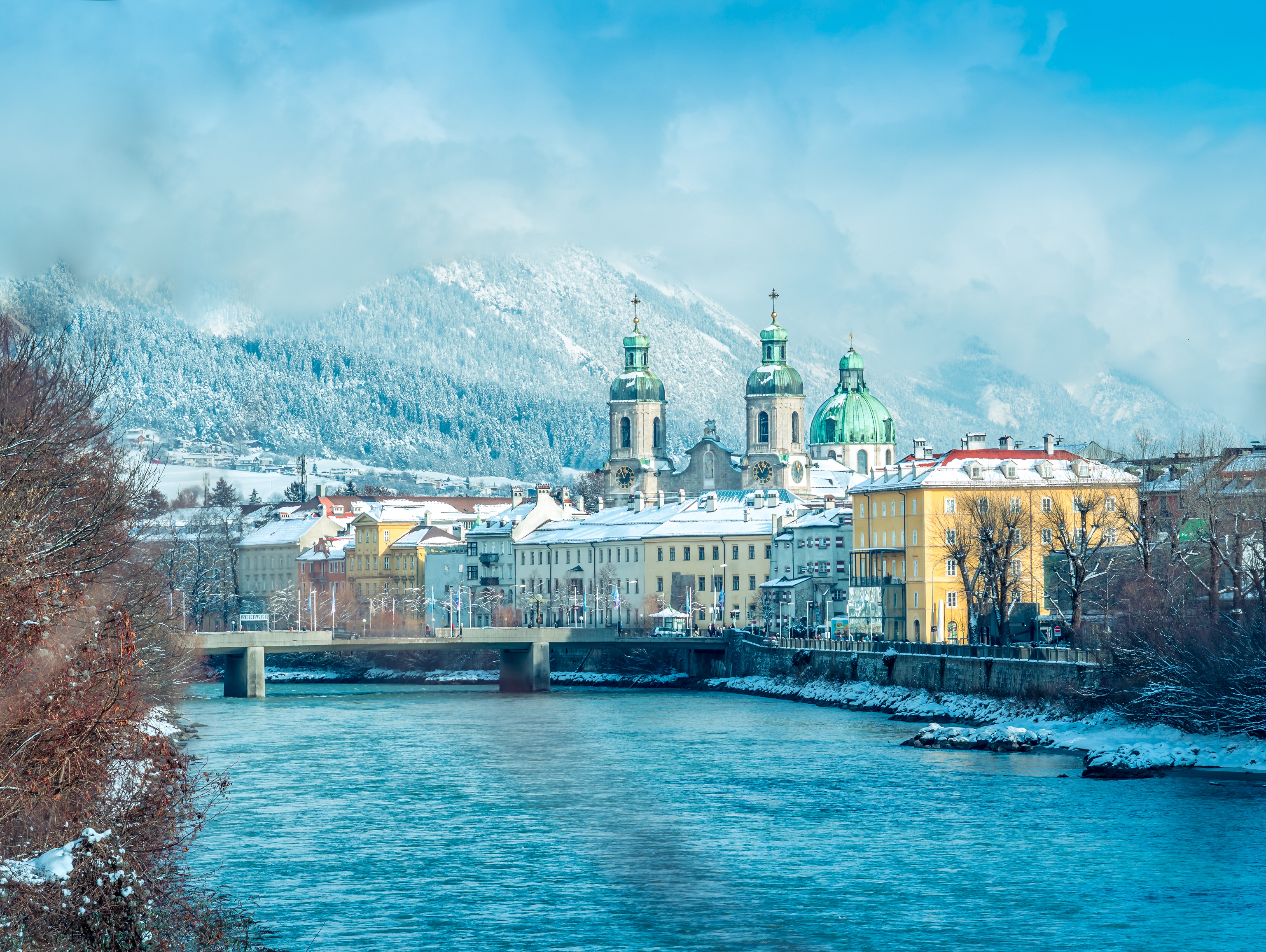 Decorative image of regal buildings in Austria covered in snow 