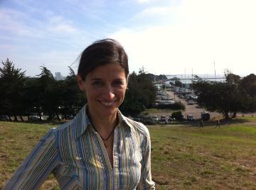 A profile photo of Kristin Kusanovich standing outside