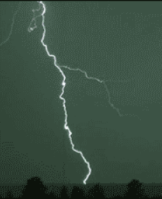 One long strand of lightning coming from the sky, touching the ground