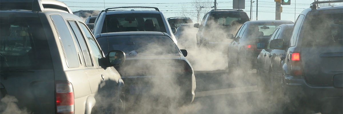 Photo of exhaust fumes released from car tailpipes.