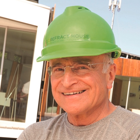 Jim Reites, S.J., on the construction site for SCU's 2009 entry in the Solar Decathlon.