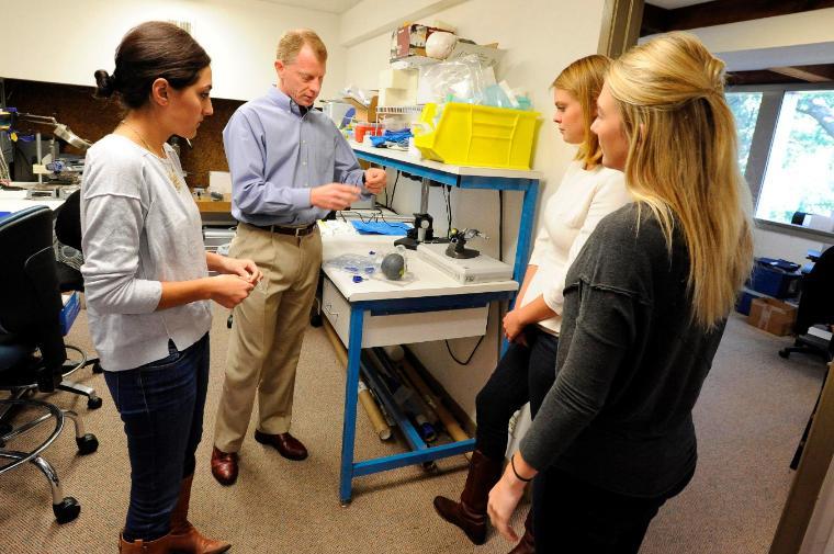Hold your tongue: bioengineering seniors Erin Araj, Leah Karlsen, and Abby Kilkenny with Erik van der Burg are designing better tools to fight potentially deadly Obstructive Sleep Apnea.