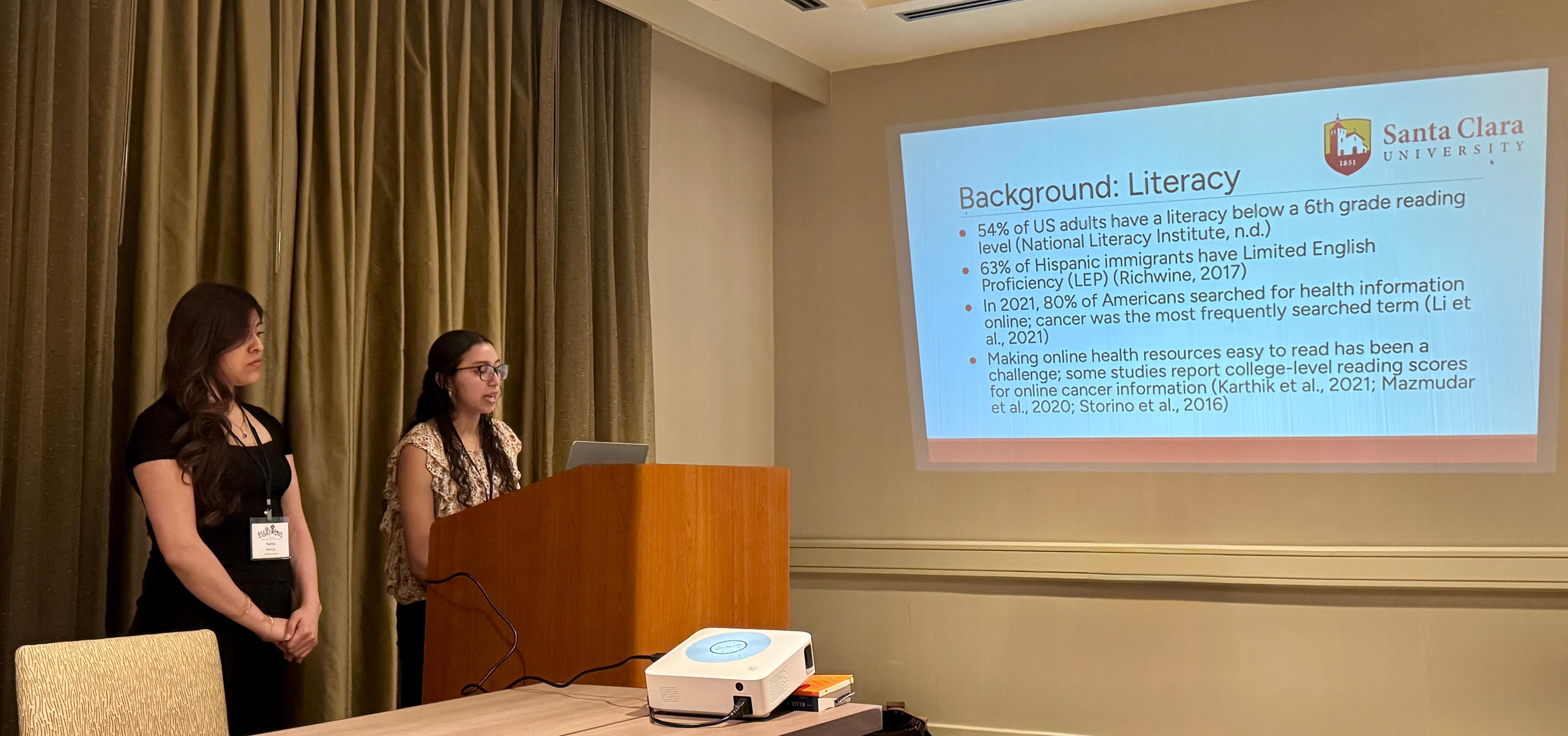 2 female students presenting their research at the 2026 Western States Communication Association Annual Conference