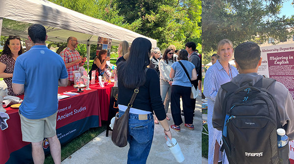 Faculty welcoming new students and parents at the Orientation Resource Fair