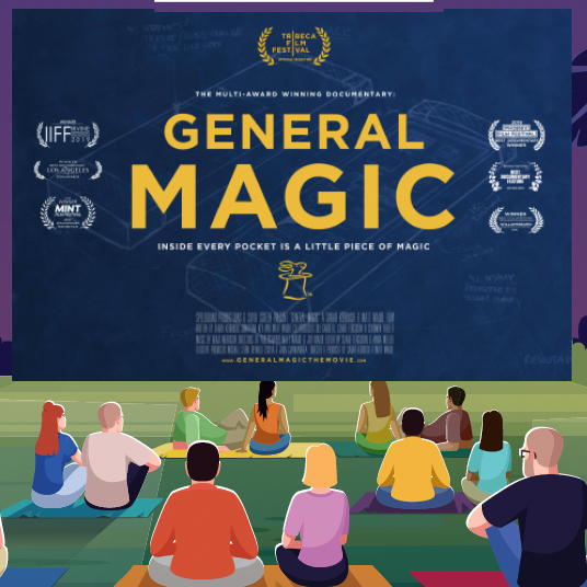 General Magic movie screen with audience sitting on the green grass.