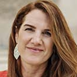 Woman with earrings and long hair, from Screen Shot 2022-10-19 at 3.04.04 PM.