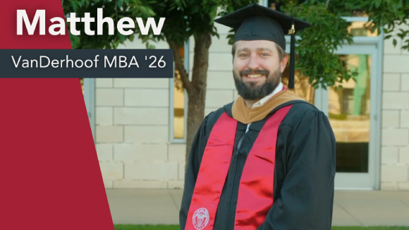 A picture of a smiling man in commencement regalia. Text to the viewers left reads Matthew VanDerhoof MBA 26.
