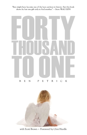 A little girl with blonde hair and costume agnel wings sits facing away from the camera. Text above her reads Forty Thousand to One. Ben Petrick with Scott Brown. Foreword by Clint Hurdle