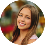 A woman smiling for a professional headshot.