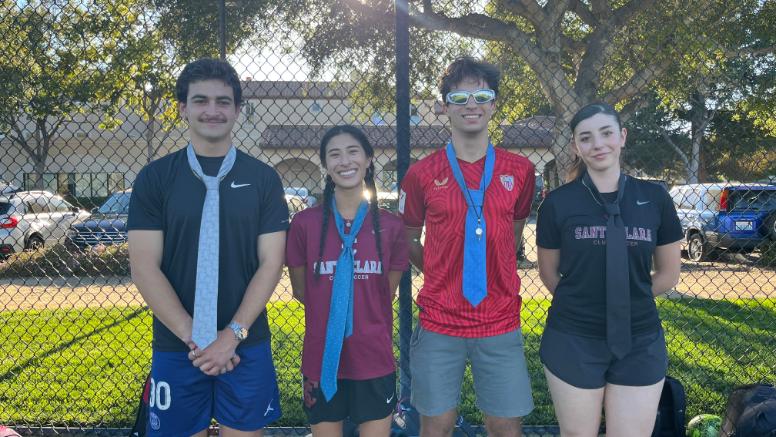 Womens Club Soccer coaches posed for a photo