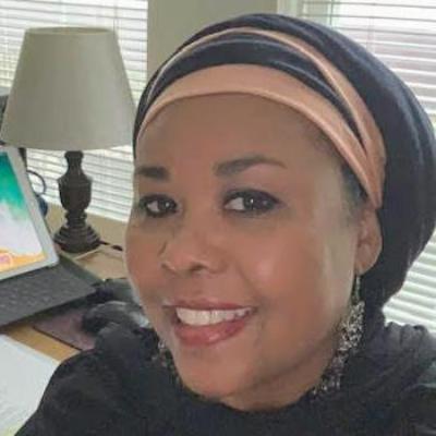 Headshot image of Ambe Jennyfer