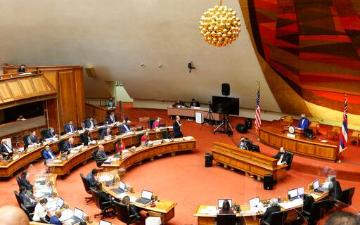 Members of the Hawaii House of Representatives discuss legislation at the Hawaii State Capitol in Honolulu, on Tuesday, May 3, 2022. Audrey McAvoy_AP Photo image link to story