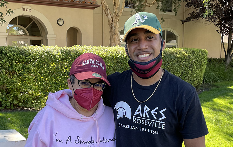 SCU transfer student Ahira Foster poses with his mother Cecilia Gaines outside Casa Italiana on move in day.
