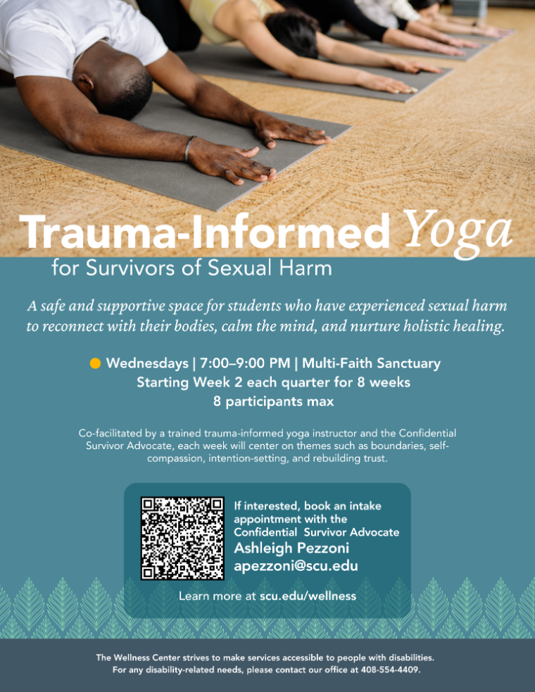 People on yoga mats practicing yoga