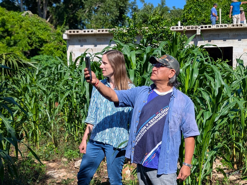 SCU's Maia Dedrick shares the first iteration of the MayanRoots app with consultant Professor Adolfo Iván Batún Alpuche, a Maya archaeologist at the Universidad de Oriente in Yucatán, Mexico.