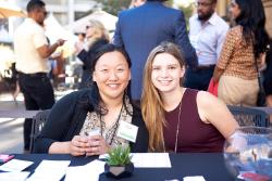 CIVA intern Athena Snyder (right) smiles for a picture while at an event at the San Jose Museum of Art.