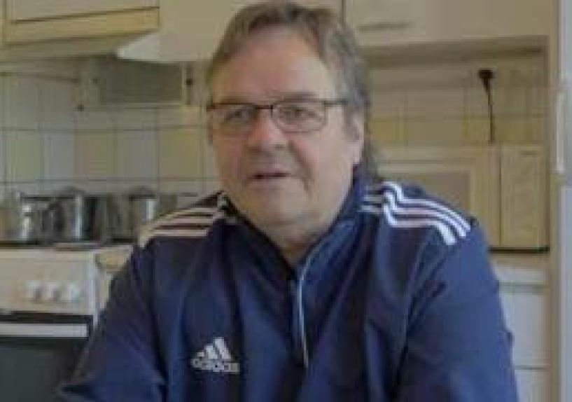 A person wearing glasses in a kitchen. image link to story