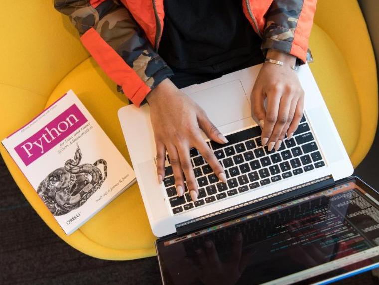 Associate Professor Grace Stokes helps her chemistry students visualize equations by integrating Python coding into her curriculum image link to story