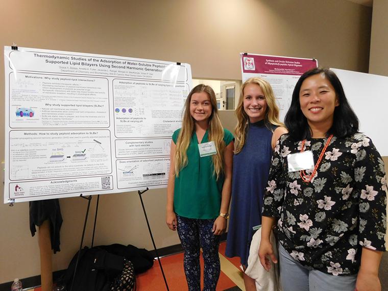  Grace Stokes and two of her students at the Peptoid Summit in Berkeley  image link to story