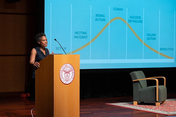 Adia Benton giving lecture on stage