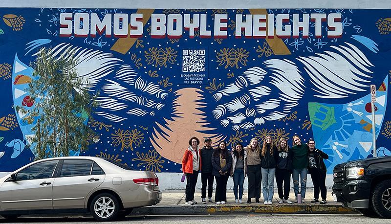 Visiting the Boyle Heights Neighborhood, from left to right: Katie Heintz, Arturo Pacheco Martinez, Karla Santos, Yomaira Cruz Cristobal, Camryn Brown, Renae Romandia McCoy, Natalie Plaia, Sarita Pettus, Kat Temple.