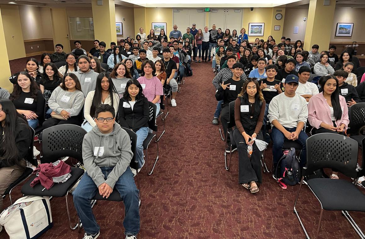 Students and their teachers from Granite Hills High School in Porterville listen to a talk by Francisco Jiménez at SCU