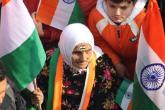 Woman in India with Indian flags