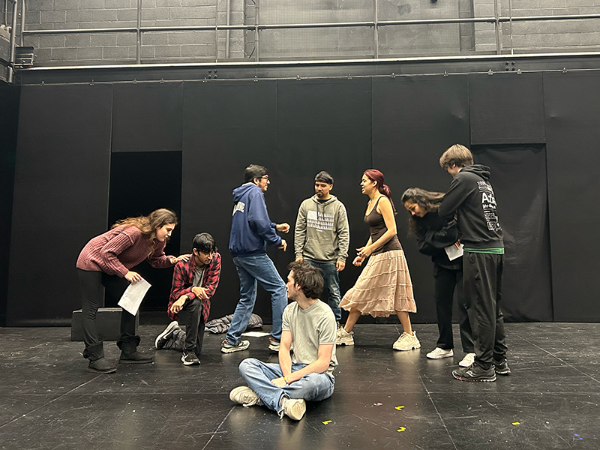 Students in Brian's winter quarter course working on developing the devised piece in Fess Parker Studio.