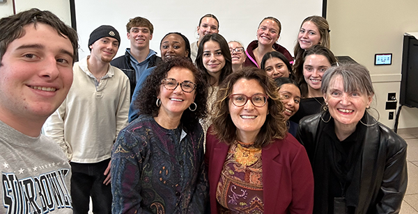 Marie Bertola and students in class