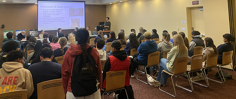Professors Eric Mosinger, Vivien Leung, Elsa Chen, Farid Senzai, and Dennis Gordon discussed politics and current events with a full house of students.