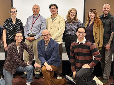 Philosophy faculty, staff, students, and alumni in the California Mission Room, Benson Memorial Center, Santa Clara University.