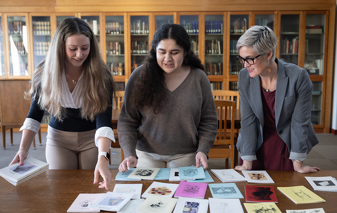 From left to right: Maddie Moran ’24, Natalia Cantu ’24, and Associate Professor Kirstyn Leuner. Photos by Jim Genshimer. image link to story