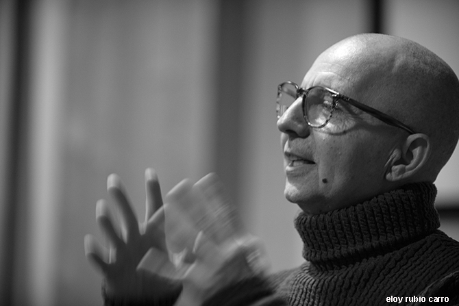 Juan Velsaco speaking with hands moving.