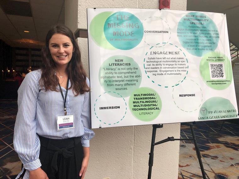 Photo of Leah Senatro next to her poster