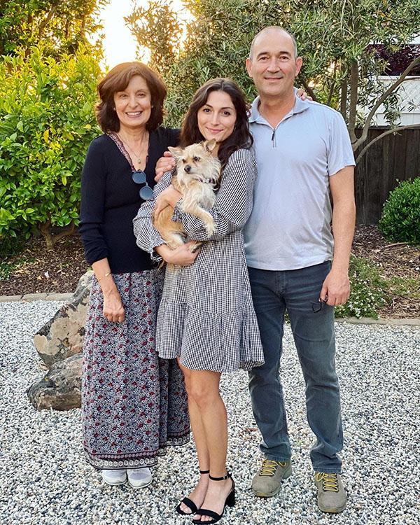 Elia Kazemi with her parents and dog