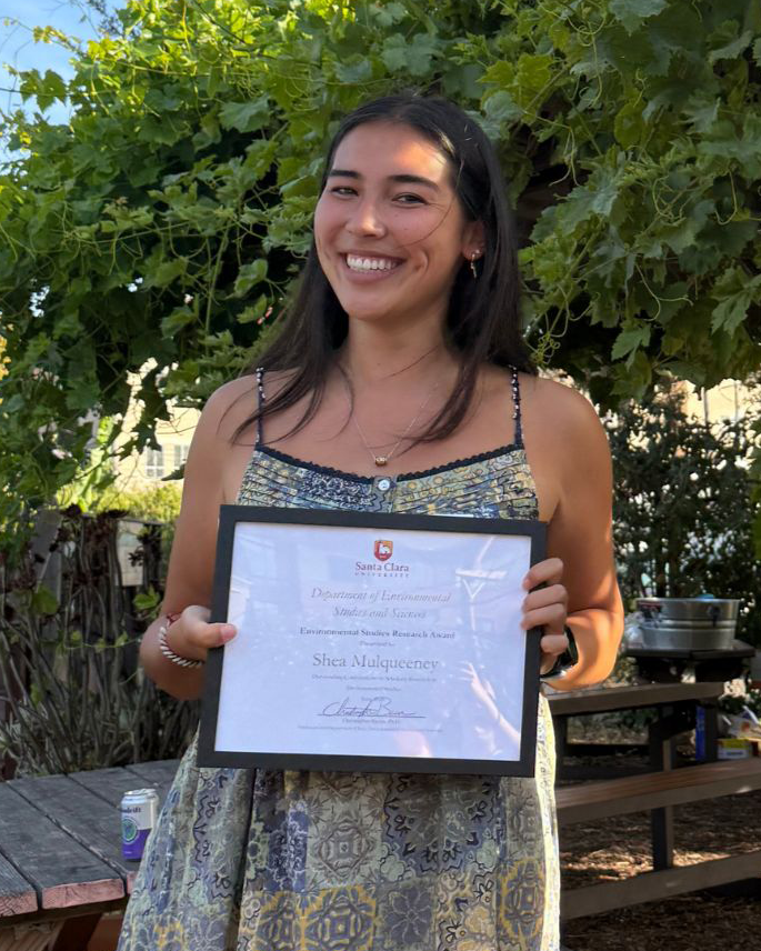 Shea Mulqueeny holding her award