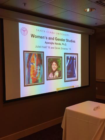 Projected slide showing three images with text at a presentation.