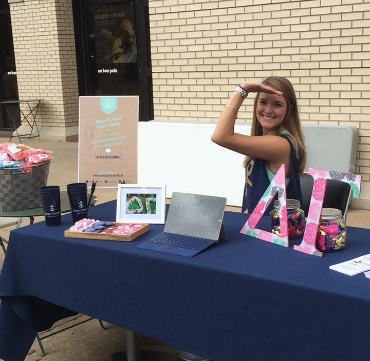 Allison Byrne at the Delta Gamma table at the University of Arkansas.
