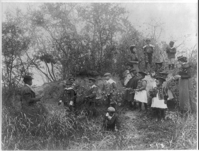 Black children playing in nature