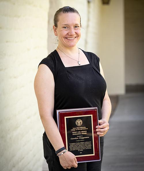 Carolyn Guggemos with her award