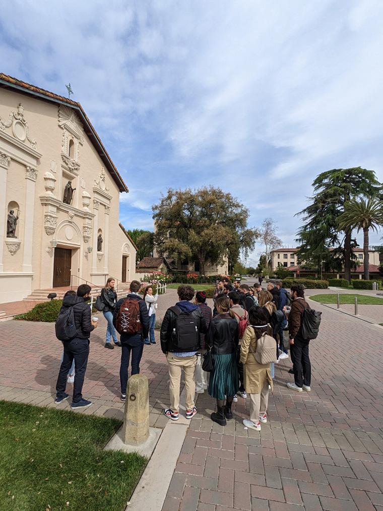 Amica Harris and students from Italy in front of Mission Santa Clara.