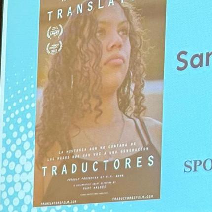 Abel Cruz speaking at the Bilingualism and Social Justice event