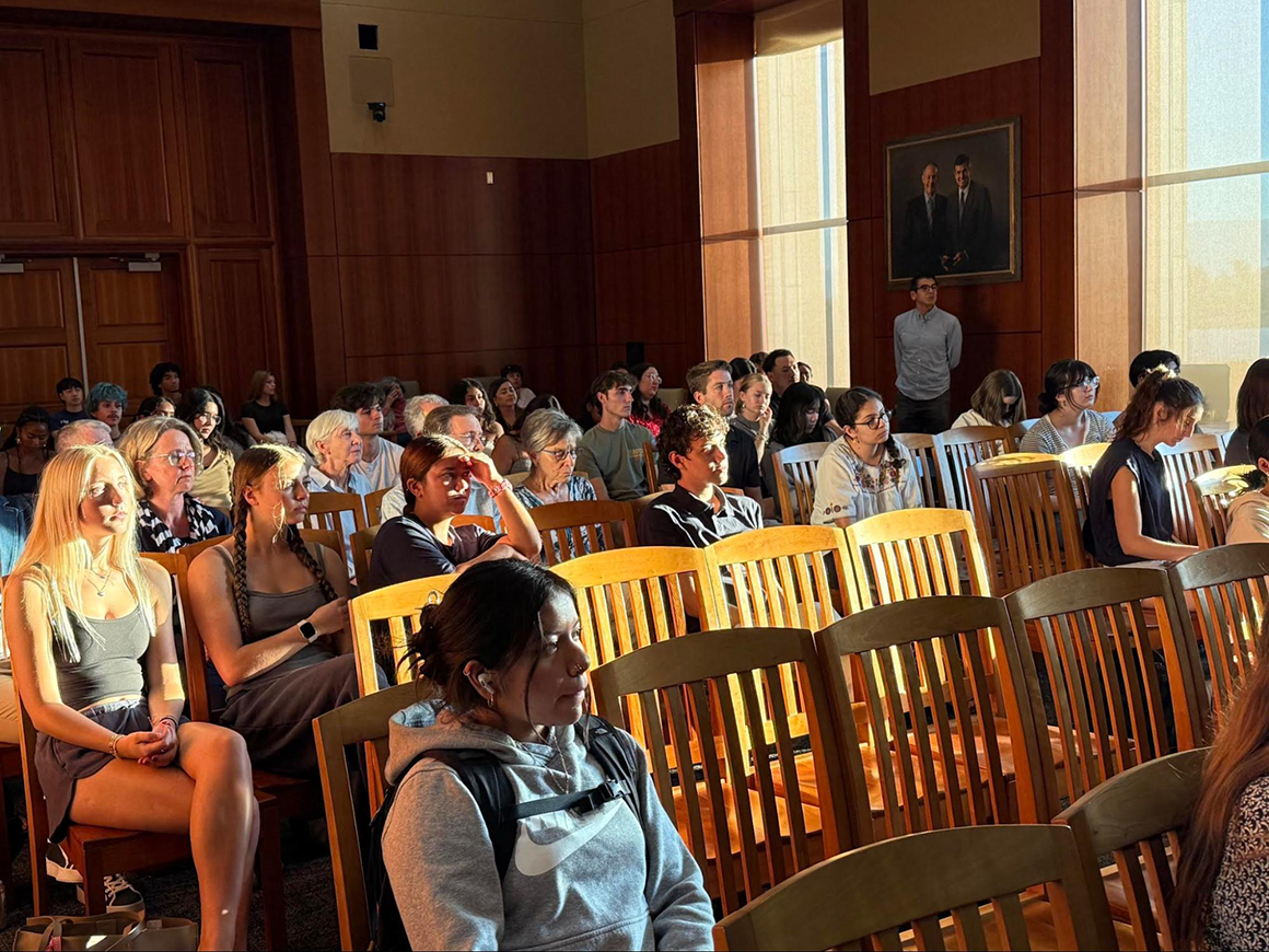 Students and other audience members at the