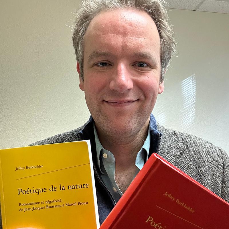 Jeff with his books. image link to story