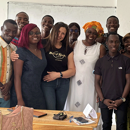 Jimia Boutouba in the Ivory Coast classroom group photo image link to story