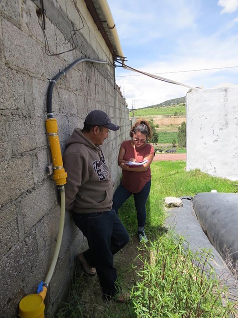 Julieta is interviewing a customer on his farm in Tlaxcala